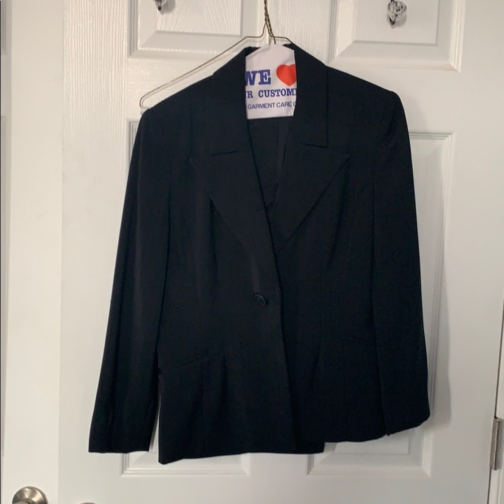Women’s black suit with shadow pinstripes